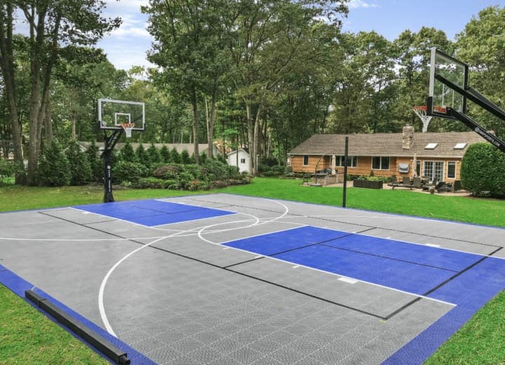 Professional Concrete Basketball Court installation in Charlotte, North Carolina by Local Concrete Contractor — commercial-grade base prep, 6-inch compacted aggregate, expansion joints sawn within 12 hours.
