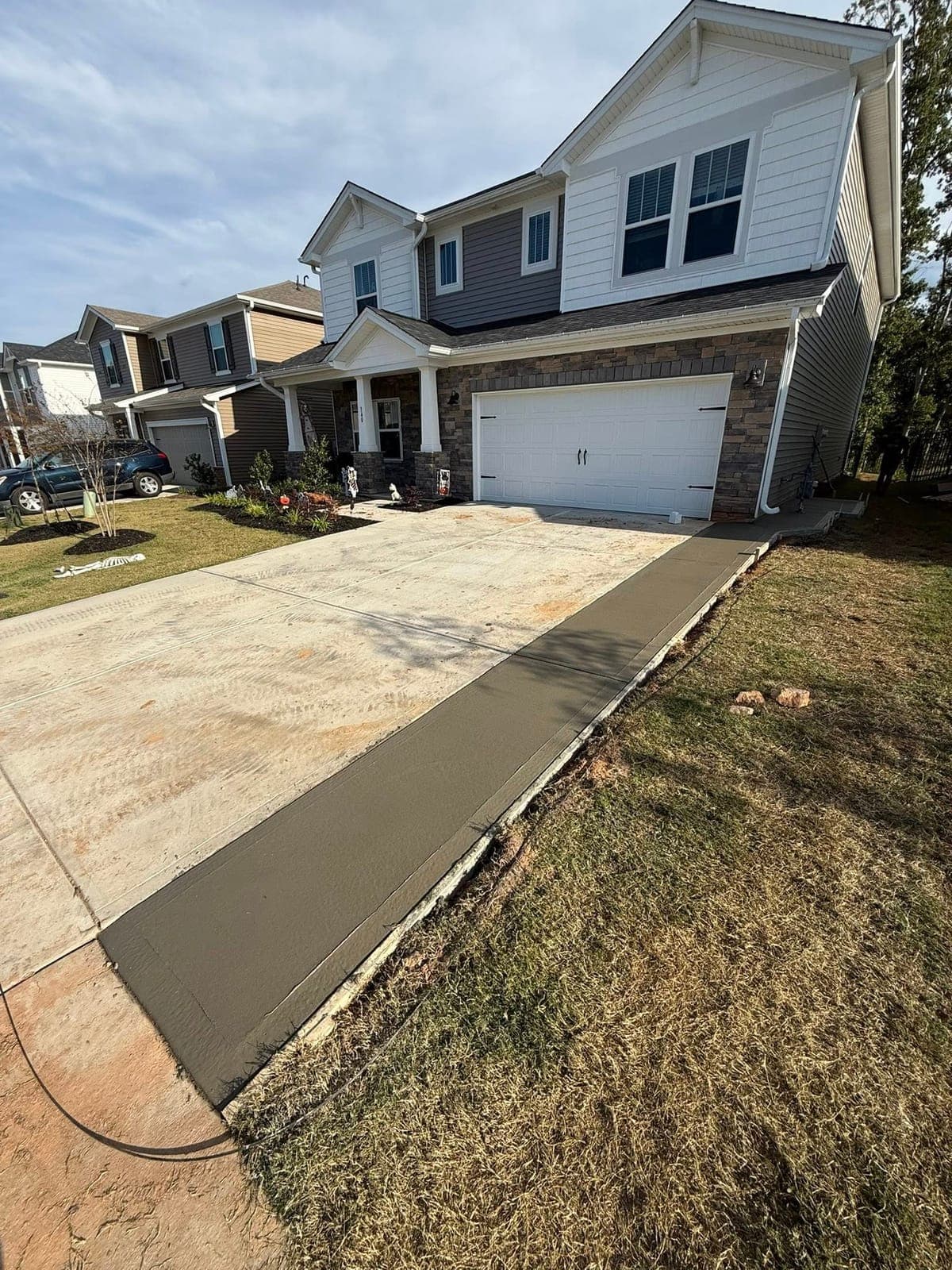 Premium Concrete Driveway Extensions services in Charlotte, NC (Mecklenburg County) by Local Concrete Contractor — engineered mix design, structural reinforcement, free written estimate same day.