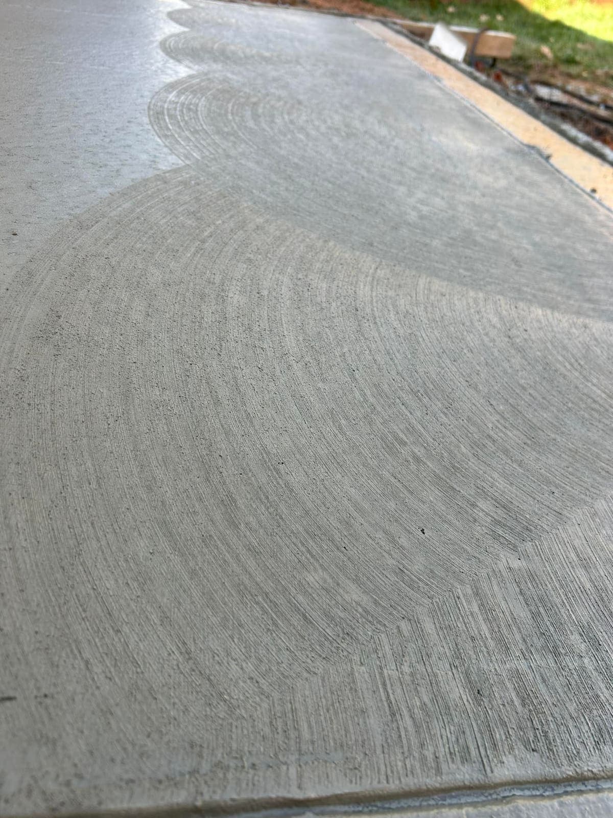 Local Concrete Contractor Custom Concrete Finishes project in Concord, North Carolina (Cabarrus County) — 4000 PSI commercial-grade concrete, expansion joints, professional broom or smooth finish.
