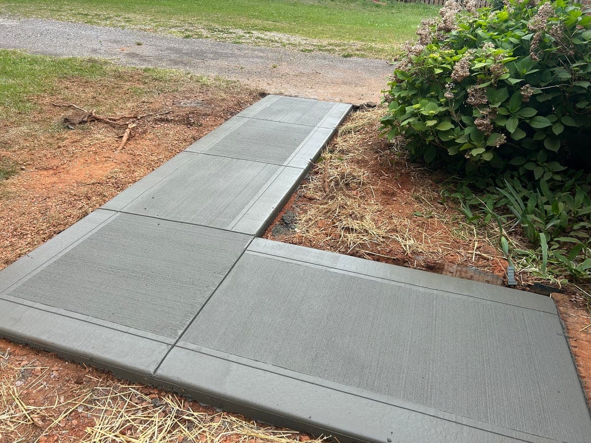 Custom Sidewalk Repair project completed in Wake Forest, NC by Local Concrete Contractor — pay-on-completion contractor, no deposit required, licensed and insured in North Carolina.