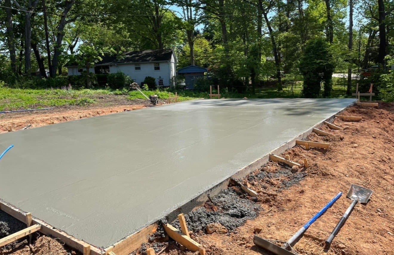 Step 11: Bull Floating in Clayton, NC concrete project by Local Concrete Contractor